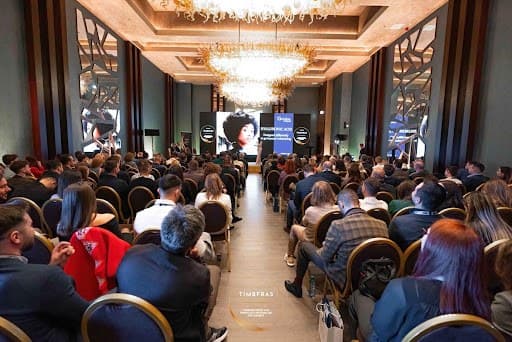 A full plenary room at Iulius Congress Hall during TIMBFRAS 2025
